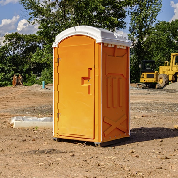 what is the cost difference between standard and deluxe portable toilet rentals in Hall County Texas